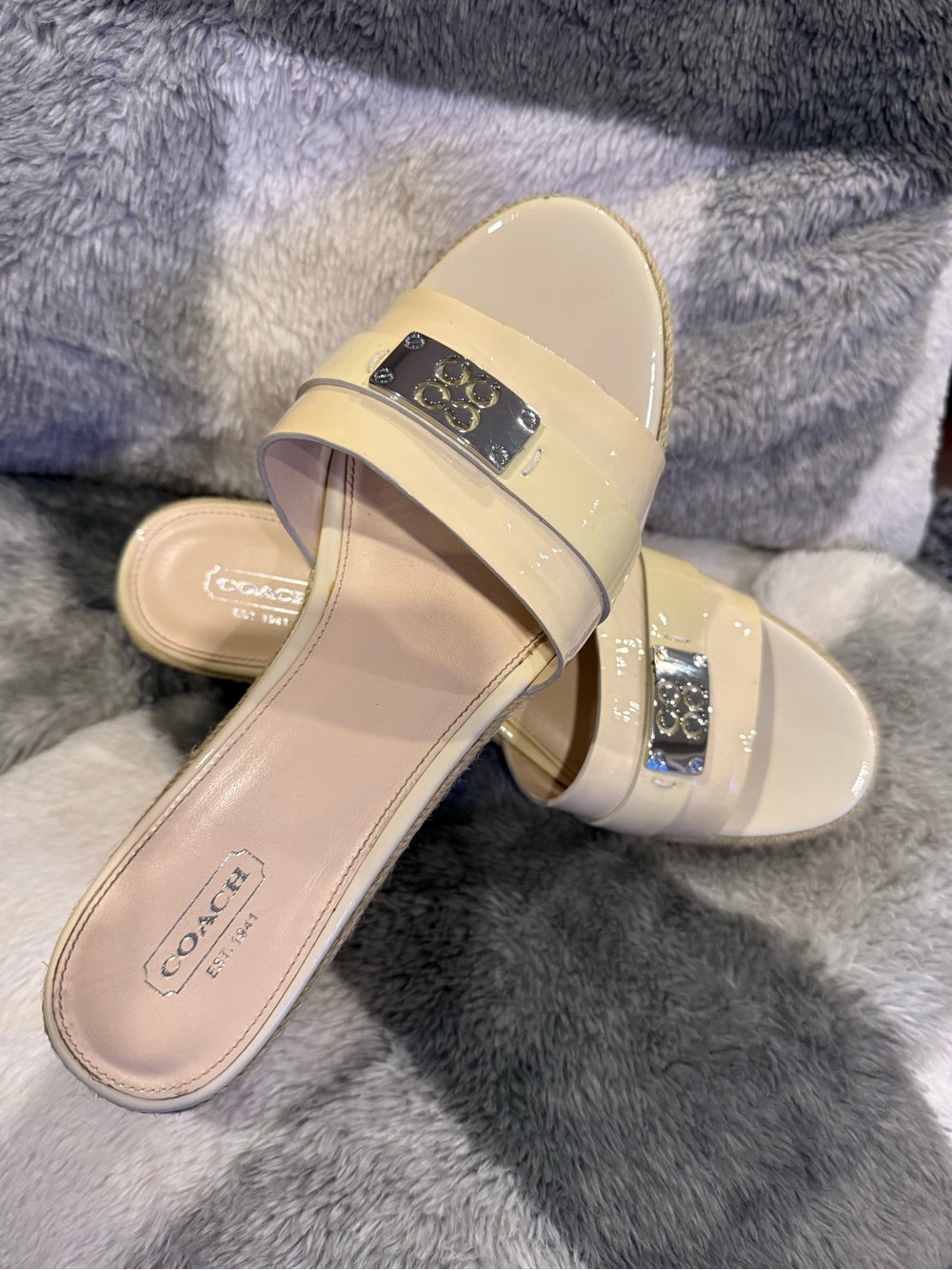 Coach Christie Cream Patent Leather Slide Wedges with Silver Logo Plaque